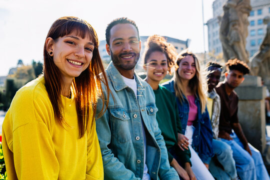 Diverse young group of college students standing together outdoor. Friendship and youth concept - Powered by Adobe