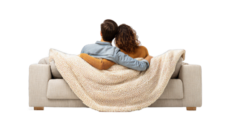 Couple Sitting on Couch with Blanket Embracing in Cozy Living Room Scene