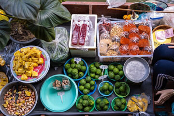 Wooden tradition boat on river in floating market sell food and drink local travel