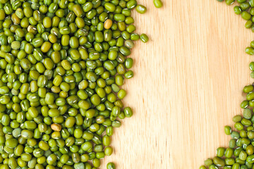 Green Mung Beans on wooden table