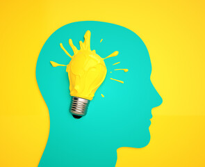 Bright concept of creativity with a colorful light bulb in a head silhouette on a vivid background