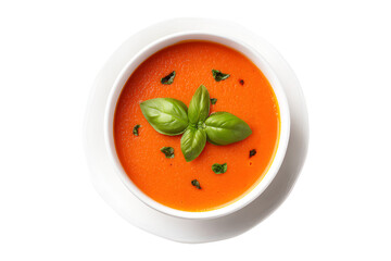 Top-down view of Creamy tomato soup served in ceramic cup elegant plan white garnished with fresh basil leaves isolated on cutout PNG or transparent background. Emphasizing appetizing presentation.