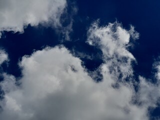 Clear Blue Sky with Fluffy White Cumulus Clouds