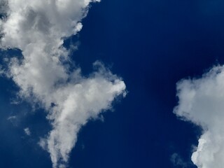 Clear Blue Sky with Fluffy White Cumulus Clouds
