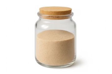 Glass jar filled with yeast powder, cork top