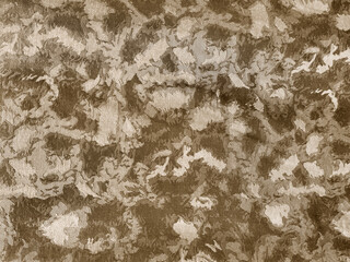 Close up of gold washed and grunge dirt in random pattern. In bright metallic gold color. Suitable for upholstery, carpet, fabric, graphic background, and wallpaper. Seamless background texture.