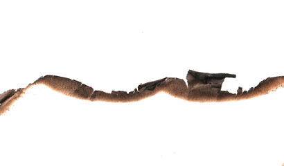 Naklejka premium Real Burned Hole in white Paper middle PNG - Scorched Edges, Burnt Texture, Distressed Element, or Grungy Frame Overlay, Burnt paper hole