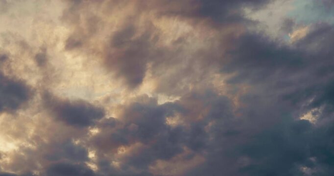Dramatic Clouds at Sunset Timelapse &ndash; Golden horizon sky transforms with shifting clouds in cinematic slow motion.
