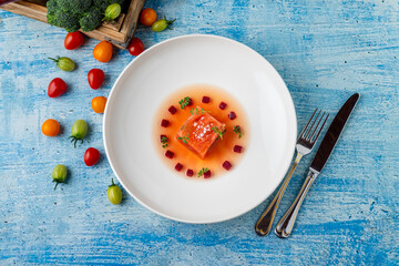 Layered tomato and beet terrine with herbs and seasoning