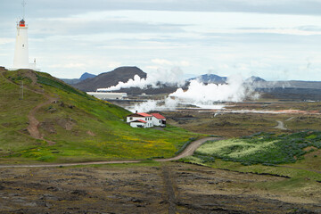 Geothermal Power Plant in Icelandic Landscape with Mountains and Hills