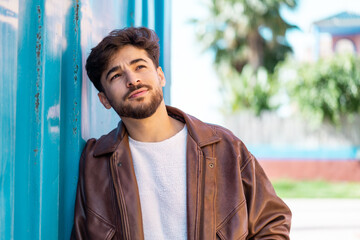 Handsome Arab man at outdoors . Portrait