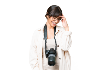 Young photographer caucasian woman over isolated chroma key background laughing