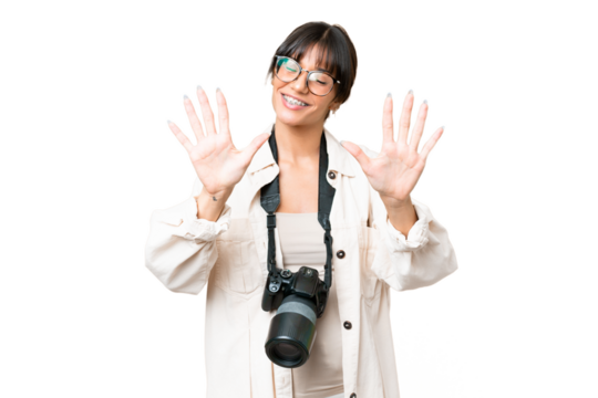 Young photographer caucasian woman over isolated chroma key background counting ten with fingers
