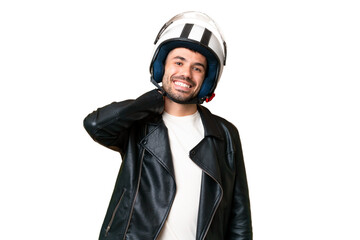 Young caucasian man with a motorcycle helmet over isolated chroma key background laughing