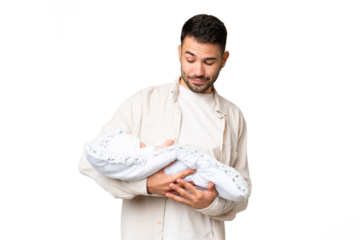 Young caucasian father with her newborn baby over isolated background with sad expression