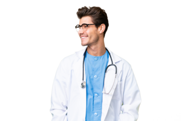 Young doctor man over isolated background looking side