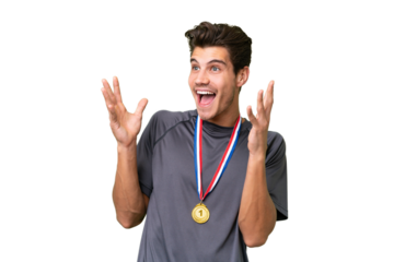 Young caucasian man with medals over isolated background with surprise facial expression