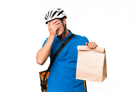 Young caucasian man taking a bag of takeaway food over isolated background with tired and sick expression