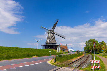 Traditional Dutch flour wind mill. Known as Molen De Herder in Medemblik , The Netherlands.