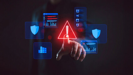 Hacker touching a digital warning sign with security icons