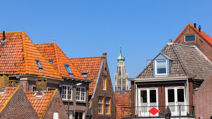 Panoramic view of heritage homes and church in historic Hoorn city, The Netherlands.