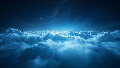 Ethereal view of clouds under a starry night sky with a soft glow illuminating the horizon creating a serene and dreamy atmosphere
