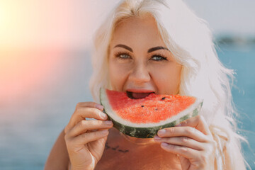 Watermelon Woman Beach Summer: Happy blonde eats juicy watermelon slice near ocean, sunny day.