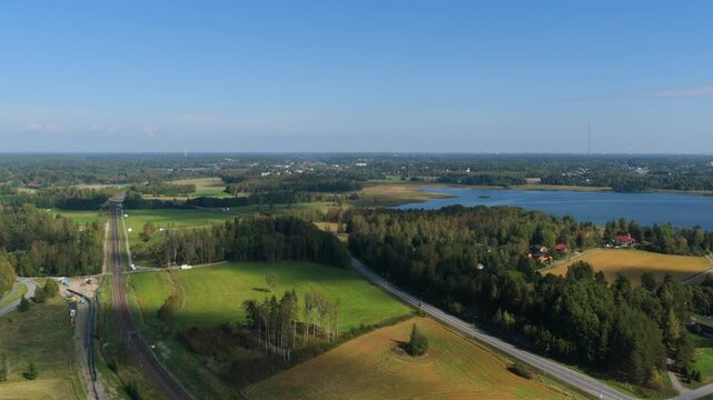 Aerial view of the railway and road Keha 3, on the countryside of Espoo, Finland