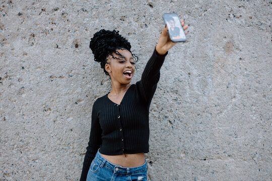 Young woman taking a selfie