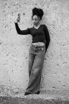 Young black woman taking a selfie