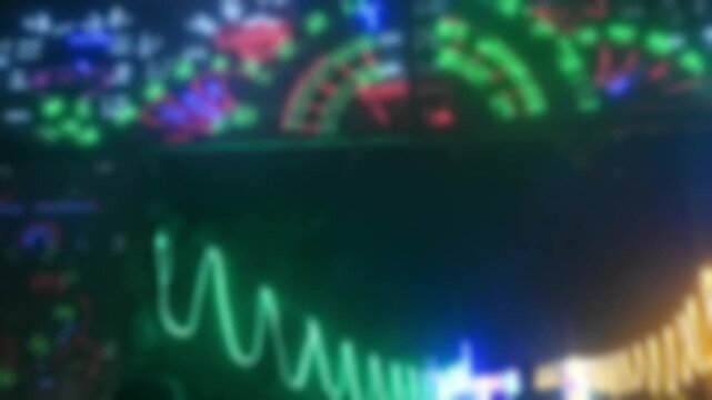 Abstract light pattern captured with intentional blur, showing colorful circular lights creating a dreamy, festive aesthetic.