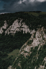Wooden cabin in the Apuseni Mountains, in Dumesti, Romania. Rural landscapes of Romania during hot summer holiday