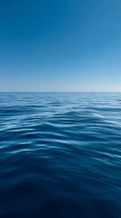 Tranquil Ocean Blue Water Ripples Under a Clear Sky
