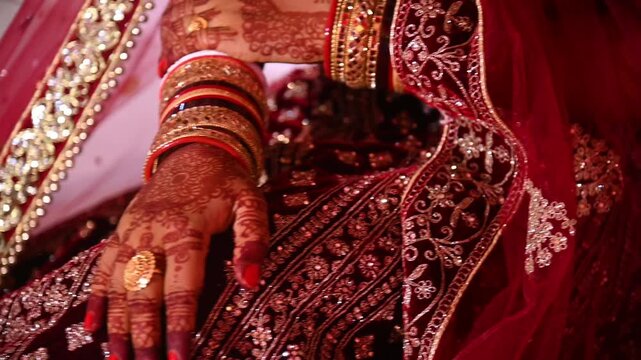 A cinematic close-up of a traditional Indian wedding ceremony, showing a couple dressed in ornate red attire and garlands, celebrating sacred rituals that symbolize union and rich cultural heritage.