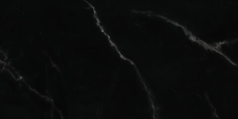 Decorative black marble surface with organic flowing lines and stone patterns. Suitable for luxury backgrounds, architecture, and branding design.