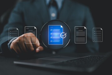 Businessman analyzing documents with magnifying glass and check mark icon, representing document verification, quality assurance, compliance review, and data validation process.