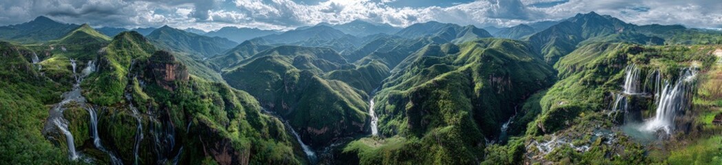 Naklejka premium Panoramic mountain vista with cascading waterfalls