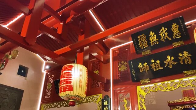 The plaque is written "Qing Shui Master" and "Boundless Blessing". It has a traditional temple and old building.
