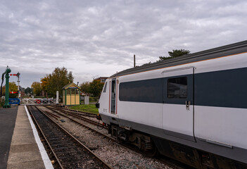 Naklejka premium View down the train platform in Dereham train station on the Mid-Norfolk Railway