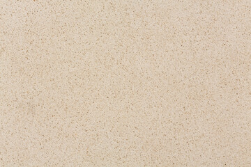 Light beige artificial stone dust sparkle texture for background.