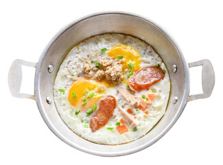 Fried eggs with toppings for Thai breakfast are called khai krata  on white back ground. top view.