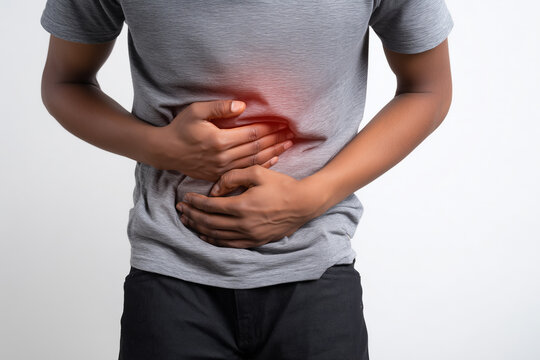 Man clutching lower abdomen in discomfort, suggesting symptoms of sexually transmitted infections like herpes, trichomoniasis, or syphilis. Red glow emphasizes pelvic pain, with clinical focus