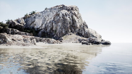 Nestled along the tranquil coast, rugged rocks rise majestically from the clear waters at dawn. Soft light casts a peaceful ambiance over the serene landscape, inviting exploration.