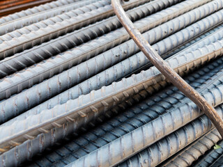 Steel reinforcement bars close-up industrial background