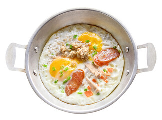 Fried eggs with toppings for Thai breakfast are called khai krata  on transparent.top view.