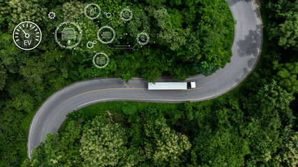 Aerial view EV semi truck trailer cargo on mountain curve road, Semi truck trailer cargo business...