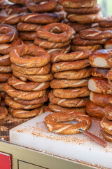 Street vendor selling Turkish simit, a leavened doughnut covered in sesame seeds, typical of...