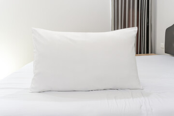 One white pillow and bed with mattress taken in resort or hotel room