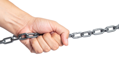 Close-up of a hand gripping a sturdy metal chain, symbolizing strength and connection. The chain is held firmly, implying control and resilience