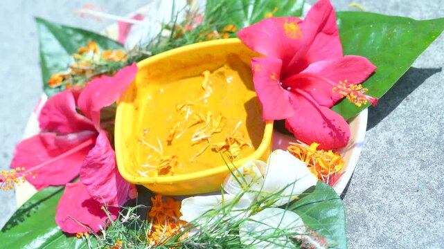A bowl filled with turmeric paste during an Indian haldi ceremony in an Indian wedding